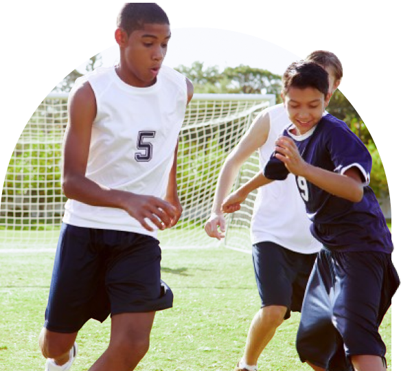 Students playing soccer