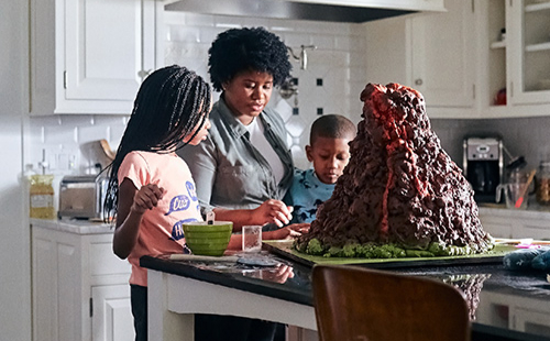 Family working on a science project